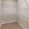 walk-in closet with built-in wire shelving