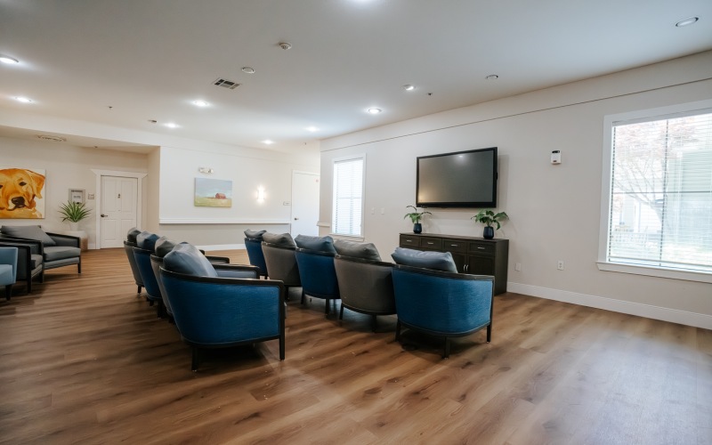 tv lounge area with natural light