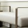 entryway bench with side tables along a  clubhouse wall