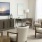 wall mounted tv and chairs in bright clubhouse