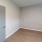 bright, room with wood flooring