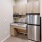 compact kitchen wall with bright lighting